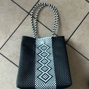 Hand crafted plastic knitted bag